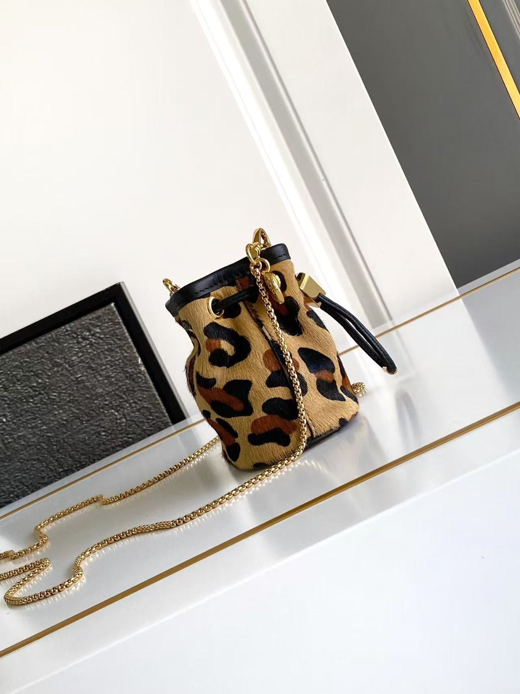 Printed leather mini pouch