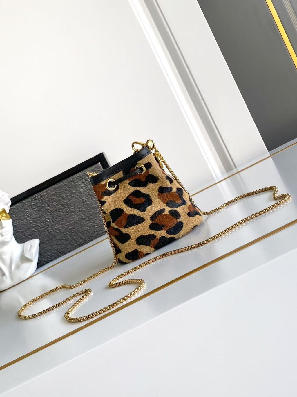 Printed leather mini pouch