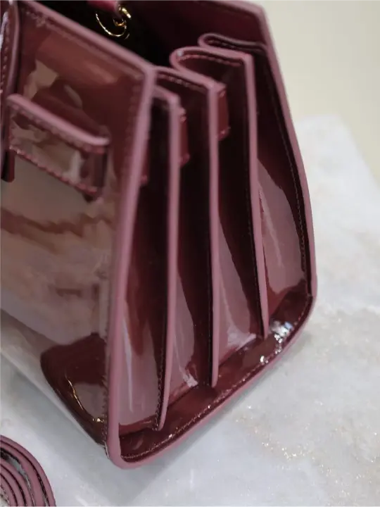 Sac De Jour burgundy patent leather handbag
