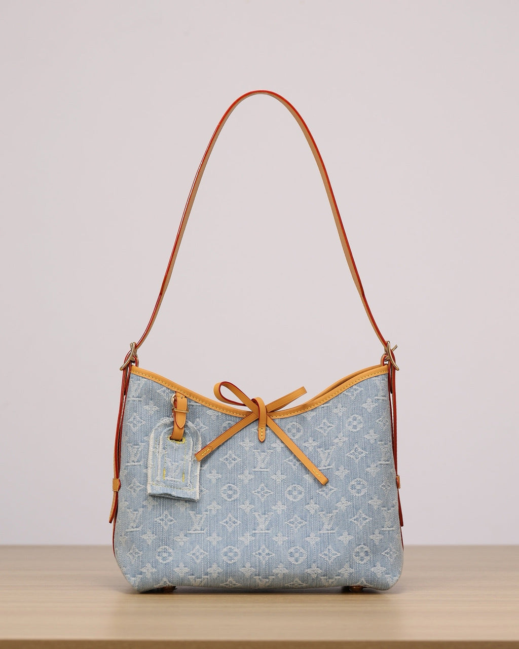 2026 CarryAll PM Handbag, Blue Monogram Denim M11462