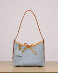 2026 CarryAll PM Handbag, Blue Monogram Denim M11462