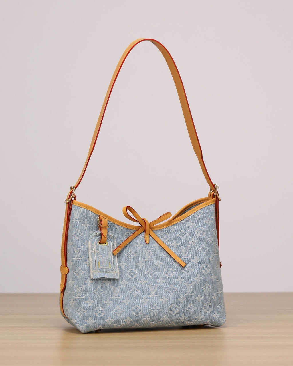 2026 CarryAll PM Handbag, Blue Monogram Denim M11462